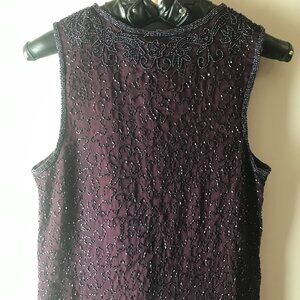 Plum-colored, hand-made, beaded sleeveless top. New, size small.